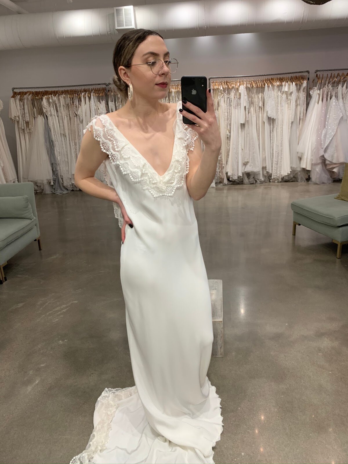 This is Claudette by A La Robe. I love the effortless look of a slip dress, and the lace adds a touch of femininity. This gown is perfect for a size 6/8 and is $1,800 (originally $2,640!).